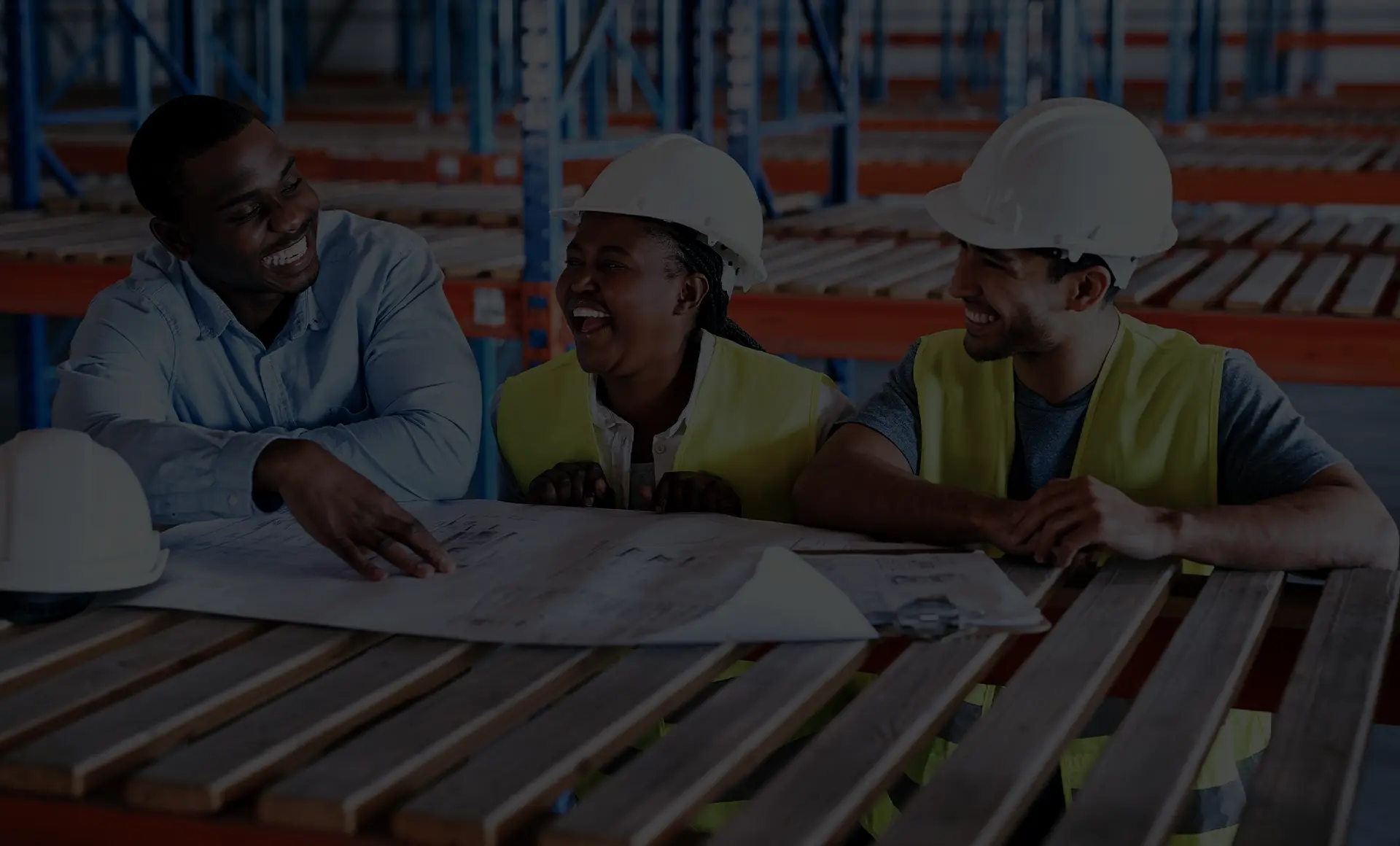Team smiling in warehouse